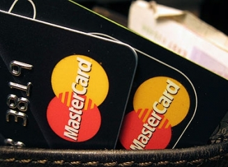 MasterCard Inc. în 2013: carduri valide – 2 miliarde, tranzacții – 52,7 miliarde, profit net – $3,1 miliarde