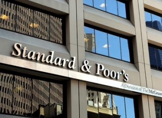 Standard & Poor’s a coborât ratingul mai multor bănci din Germania, Marea Britanie şi Austria